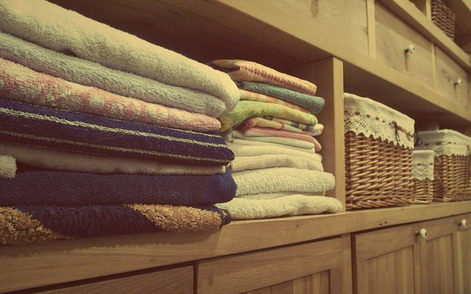 A counted stack of folded household linen